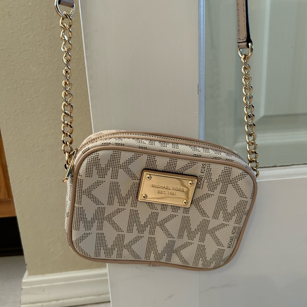 Small Michael Kors crossbody purse.